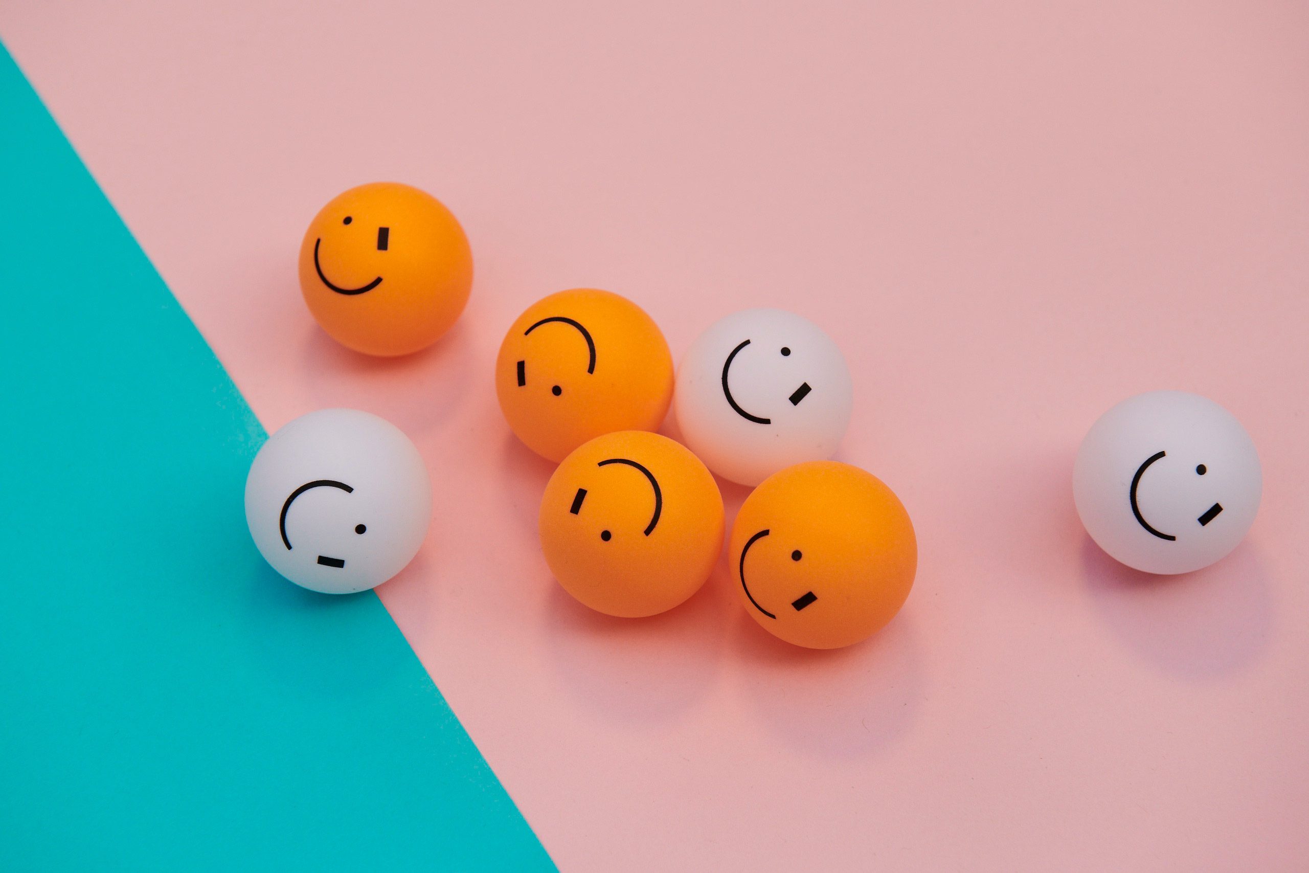 colourful smiley face ping pong balls