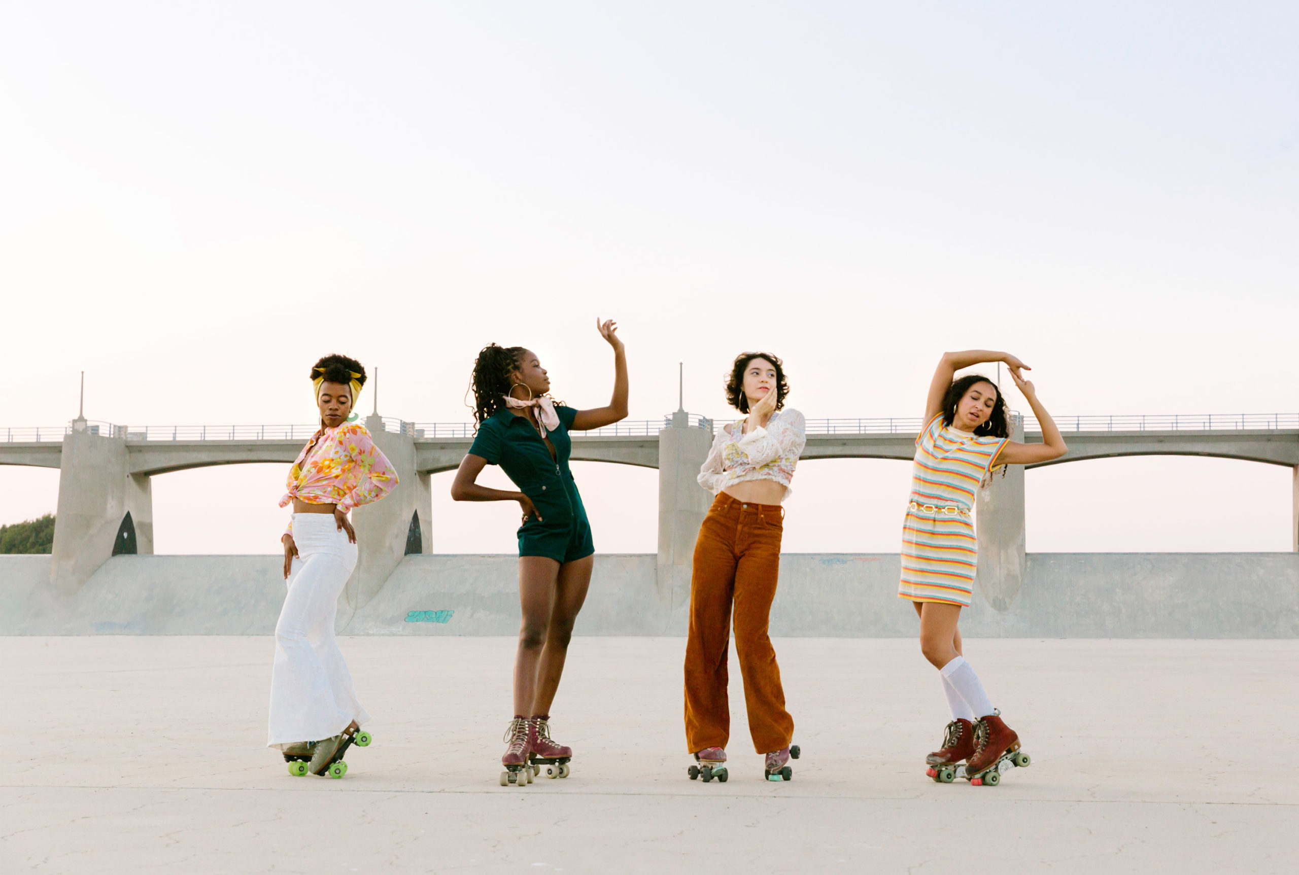 glorious sista skate women rollerskating posing group