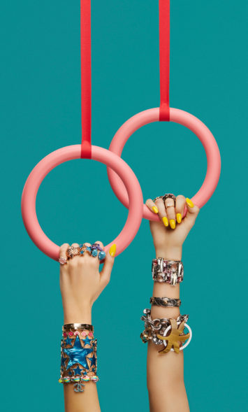 glorious aleksandra kingo lets get physical woman holding rings with rings