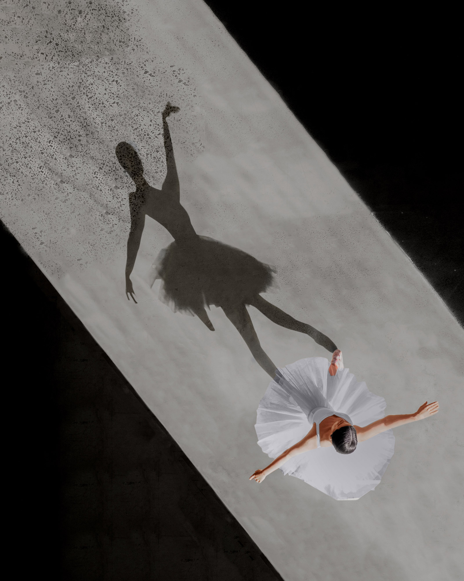 Aerial shot of a ballerinas shadow