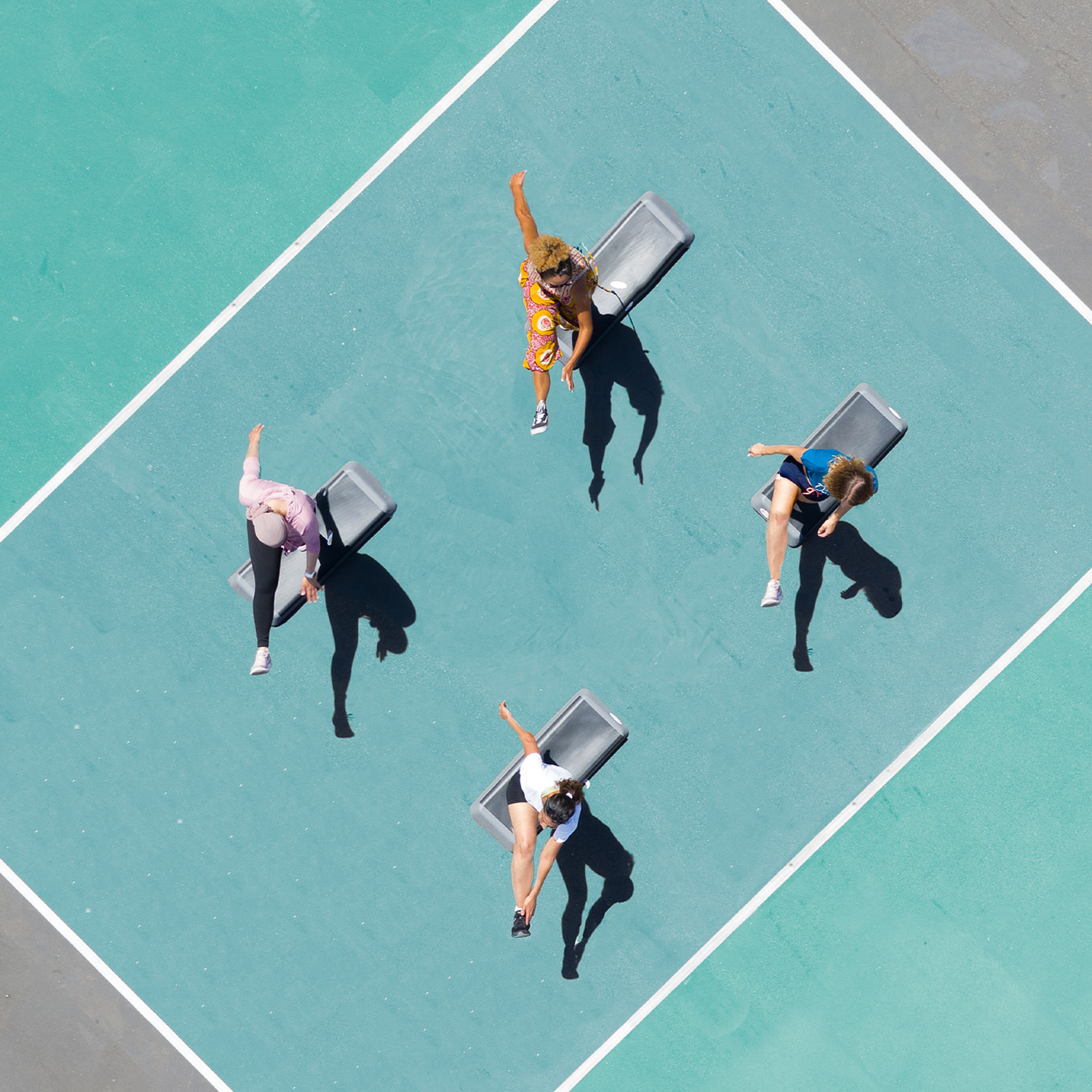 Aerial Shot of 4 people exercising