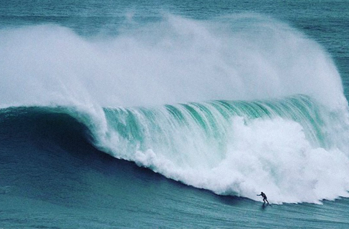 Surfing giant wave