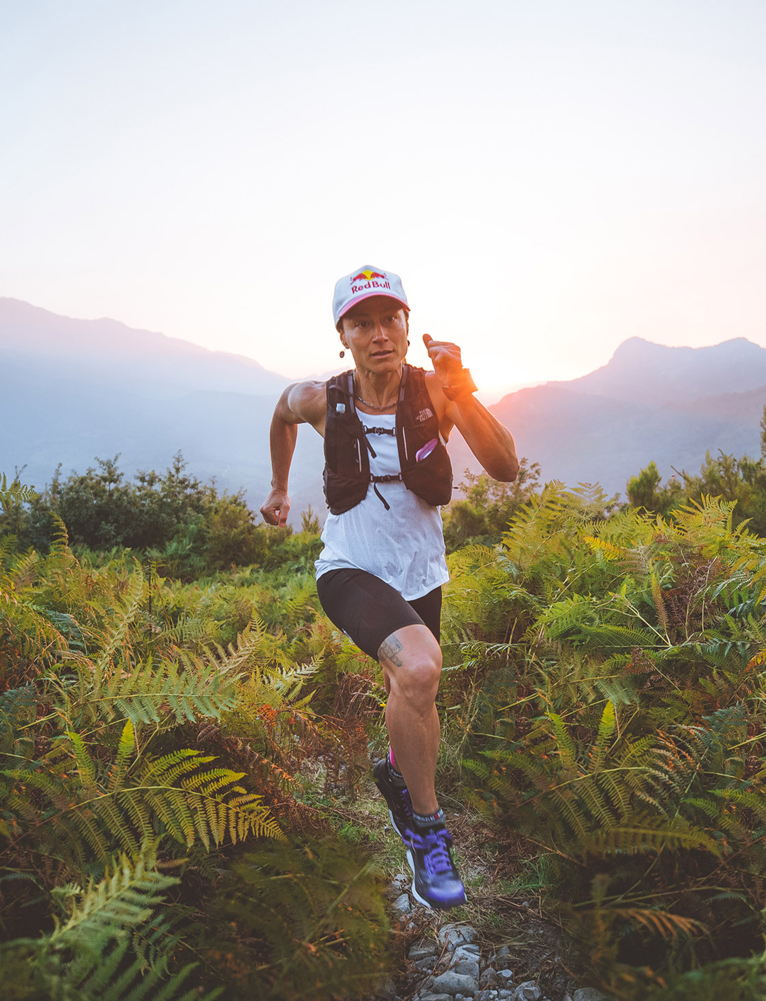 Fernanda Maciel running amongst mountains
