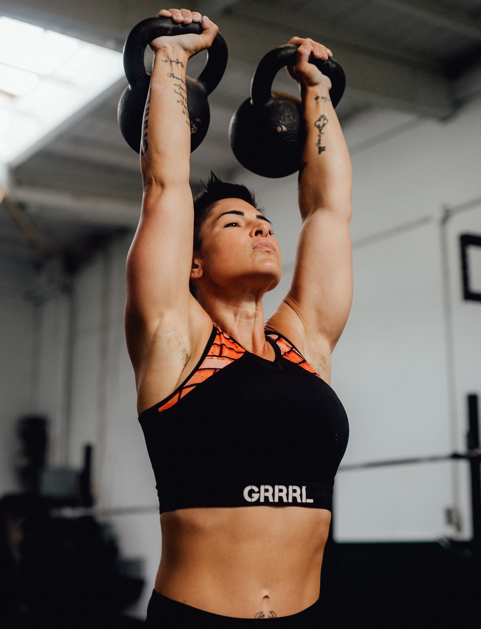 Kortney Olson lifting weights