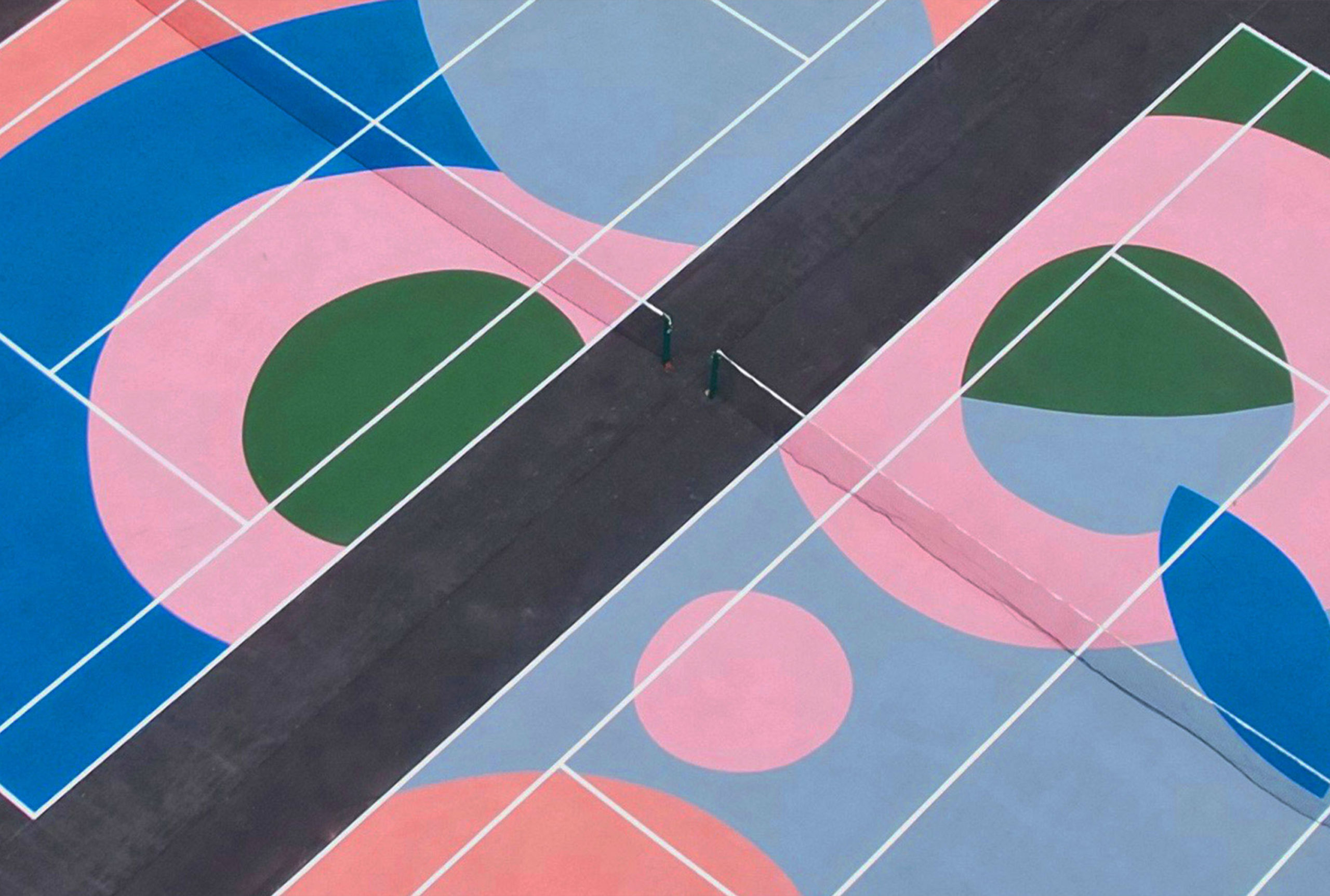 glorious polaroid lois o’hara art tennis court painted bright colours aerial view