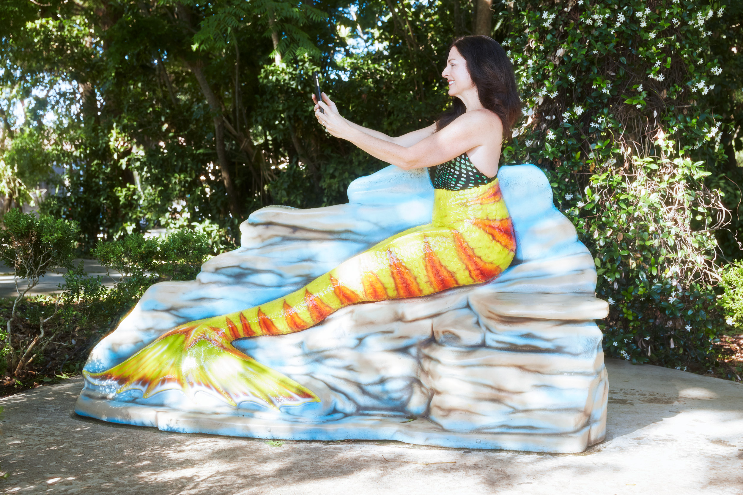 glorious mermaids charlie engman florida mermaid posing for selfie in park